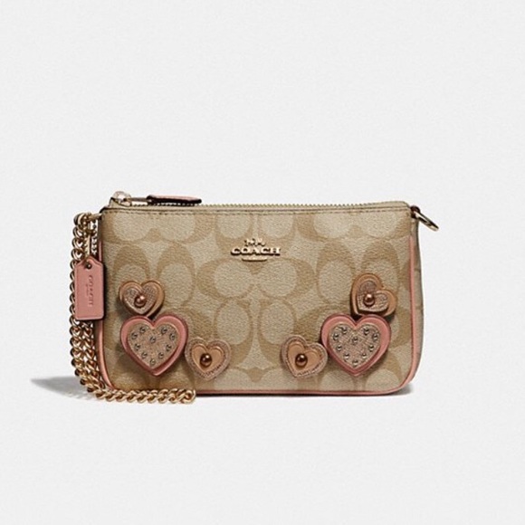 Coach Handbags - NWT Coach Large Wristlet with hearts 💕 design